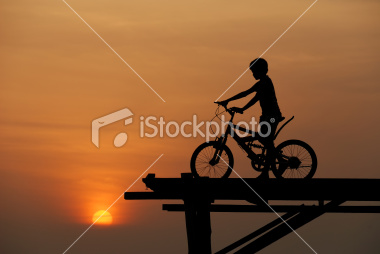 istockphoto_15481598-boy-sitting-on-bicycle-1.jpg