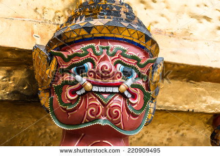 stock-photo-red-face-giant-in-the-temple-of-the-emerald-buddha-bangkok-220909495.jpg