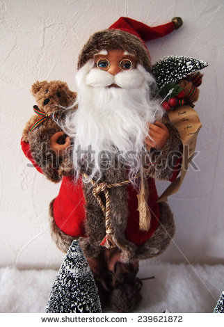 stock-photo-christmas-santa-doll-holiday-gift-239621872.jpg