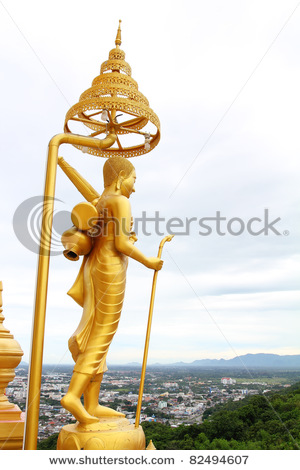 stock-photo-buddha-standing-on-a-mountain-nakornsawan-province-thailand-82494607.jpg