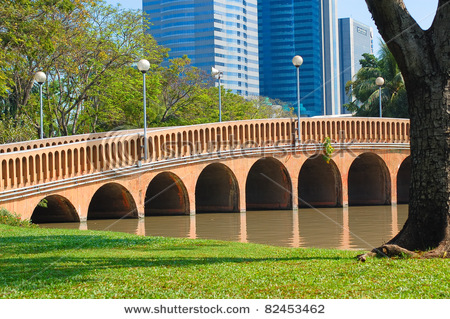 stock-photo-footbridge-in-a-park-82453462.jpg
